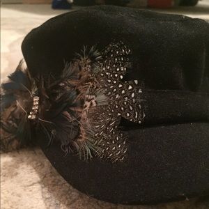 Cute hat with feathers